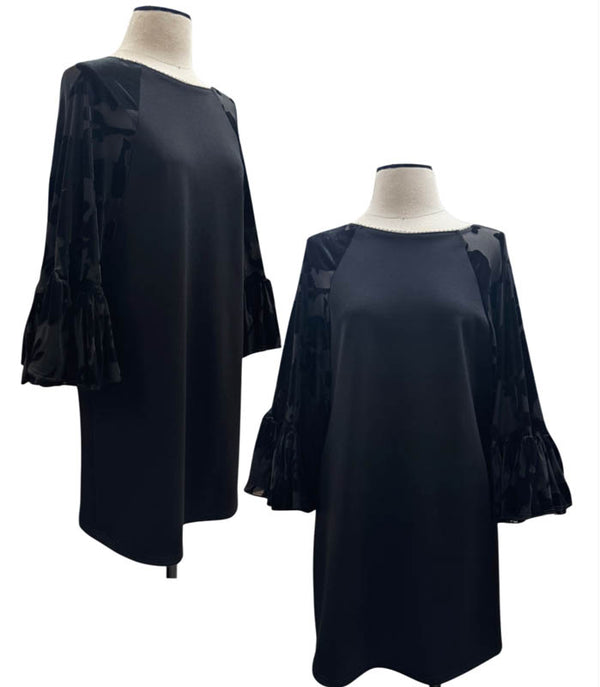 Little black dress is great on it's own or with leggings and boots.  Beautiful ruffle dolman sleeve is in black velvet burnout.  