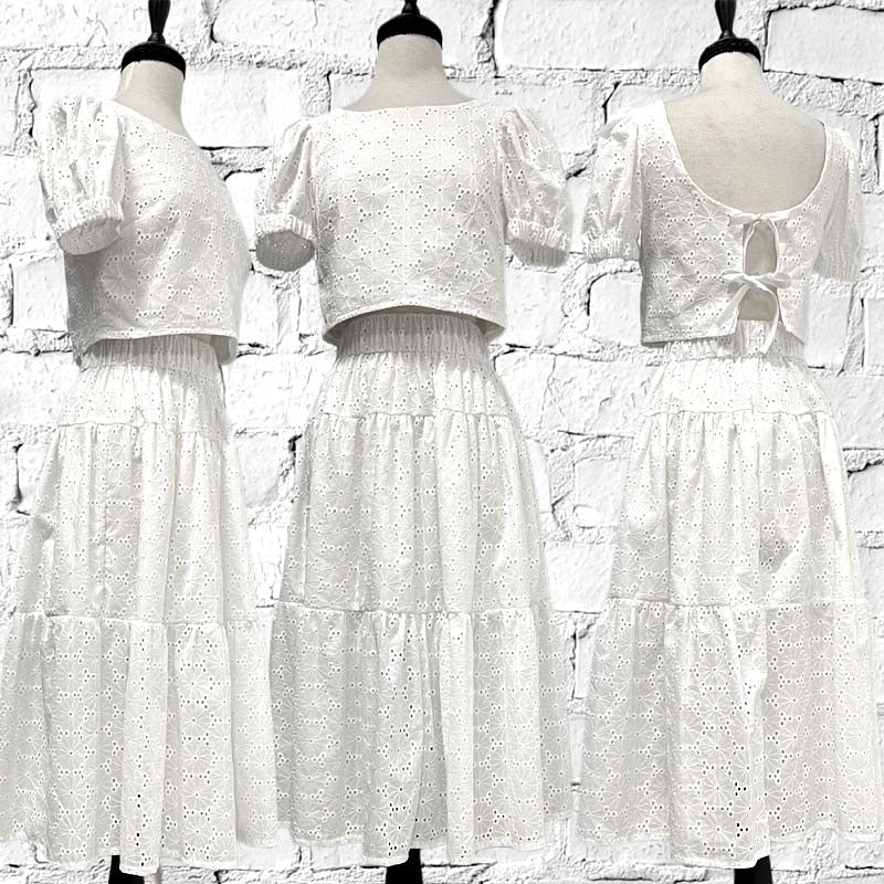 Stay cool and cute in this 2 piece white eyelet summer set.  Wear the top with jeans, or the skirt with a T.  So versatile