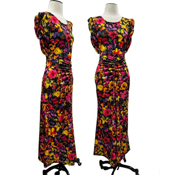Medium Weight Poly Knit with ruched tummy and sleeves.  Very flattering fit!