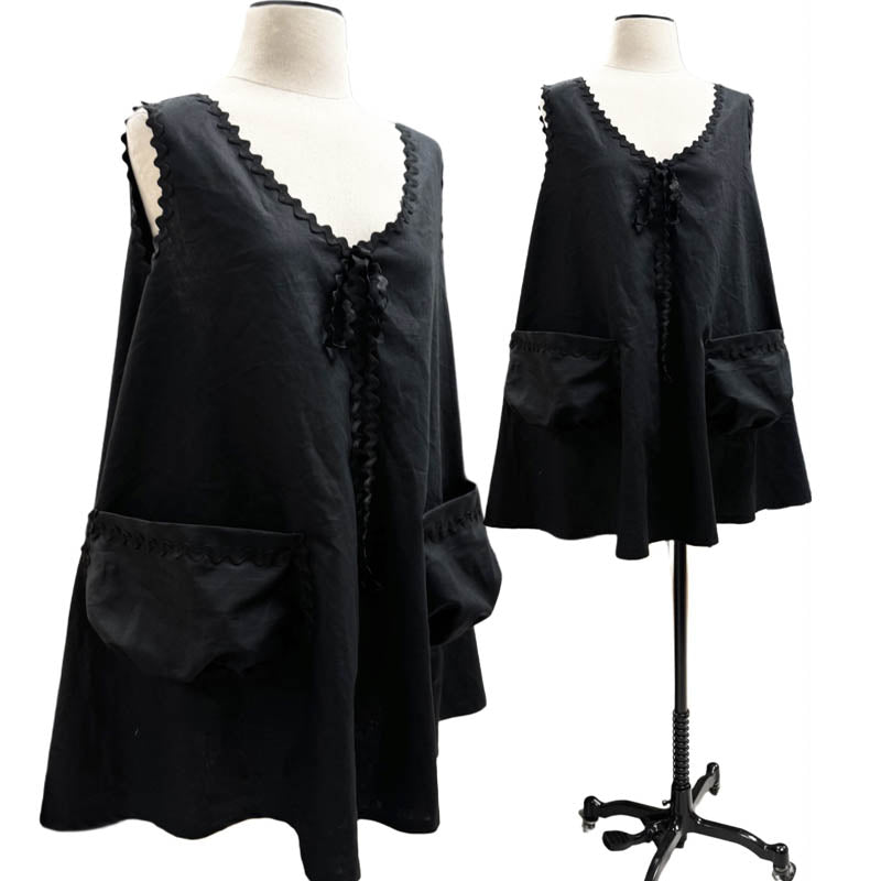 The cutest summer tunic dress in black linen with oversized front pockets