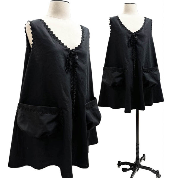 The cutest summer tunic dress in black linen with oversized front pockets