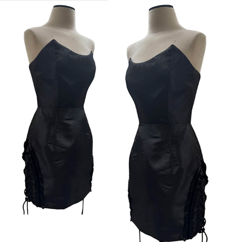 A black strapless mini dress in black taffeta.  Lace detail on sides.
