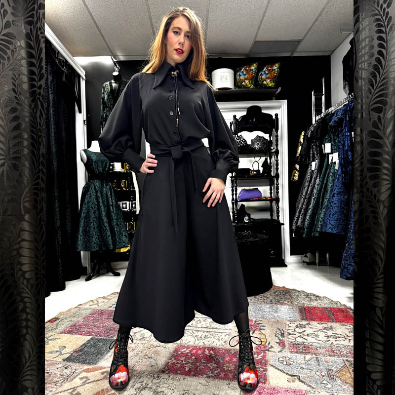 Western wear with bolo tie and piper pants