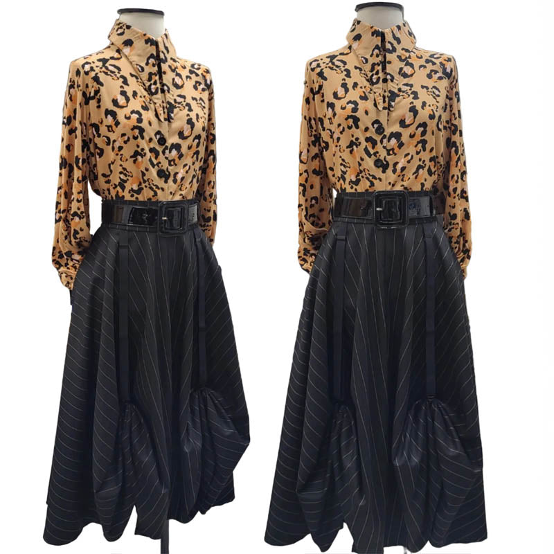 Pinstripe Skirt that has adjustable suspenders to short or lengthen the skirt.  Has pockets too! 