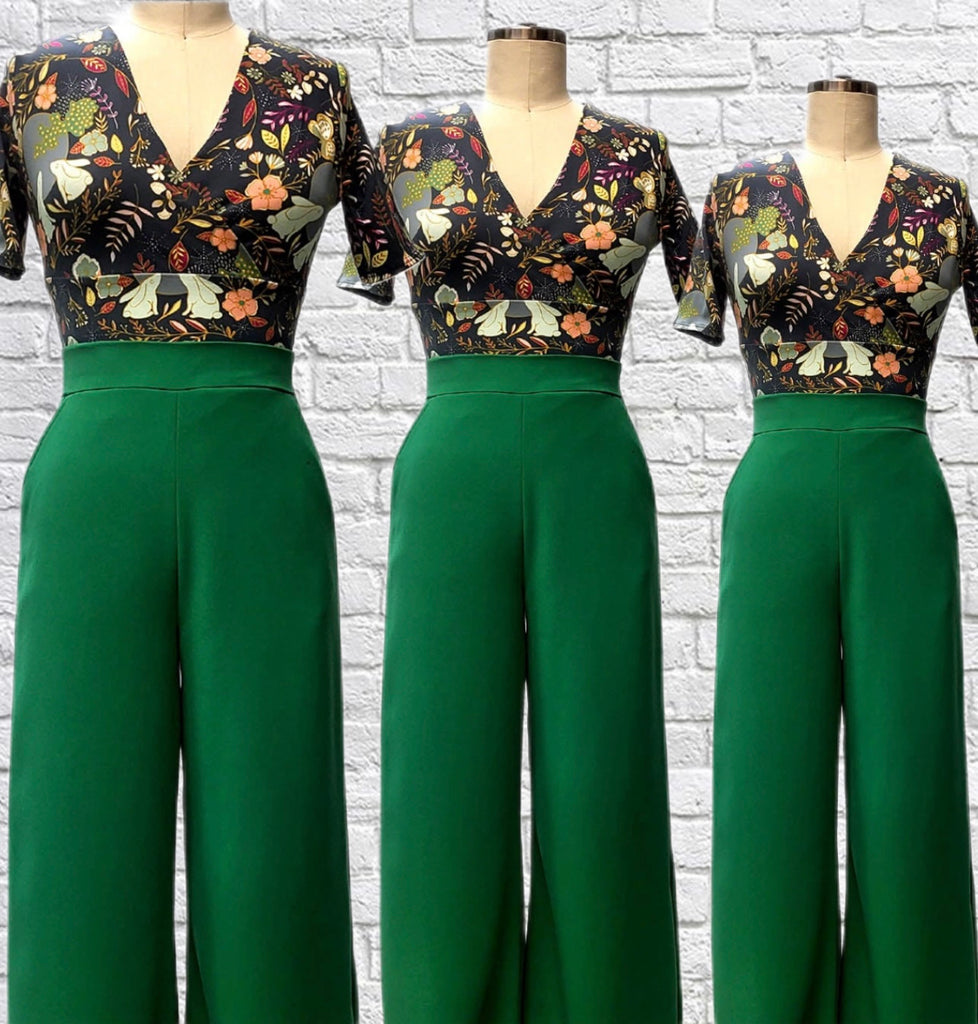 Mannequin form showing the Ivy Pants in Kelly Green, featuring a High-wasted palazzo pant style in downtown suiting ad side slash pockets, zipper in back.