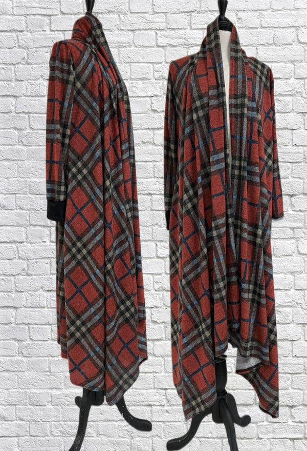 Mannequin forms showing the Janice sweater is back in fine spun knit Orange and Blue Plaid with bamboo knit cuffs, open front, and asymmetrical hem.