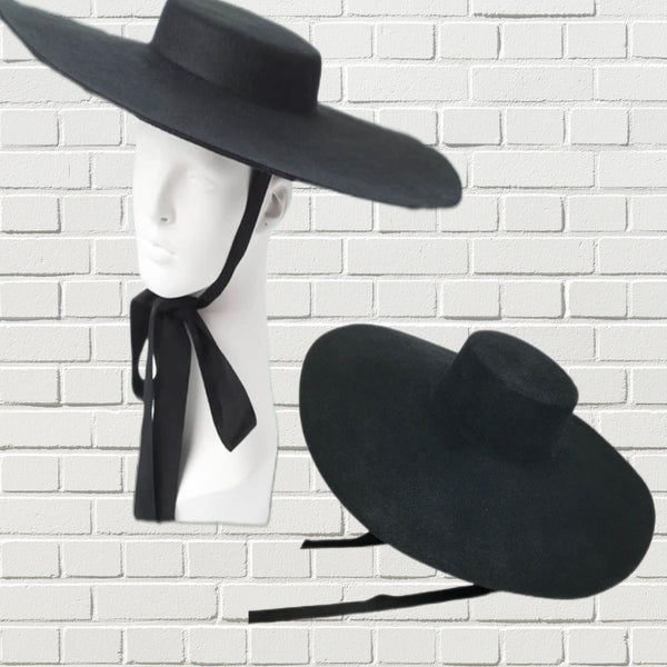 Mannequin head showing the oversized bolero hat in black felt wool with back chin ribbon.