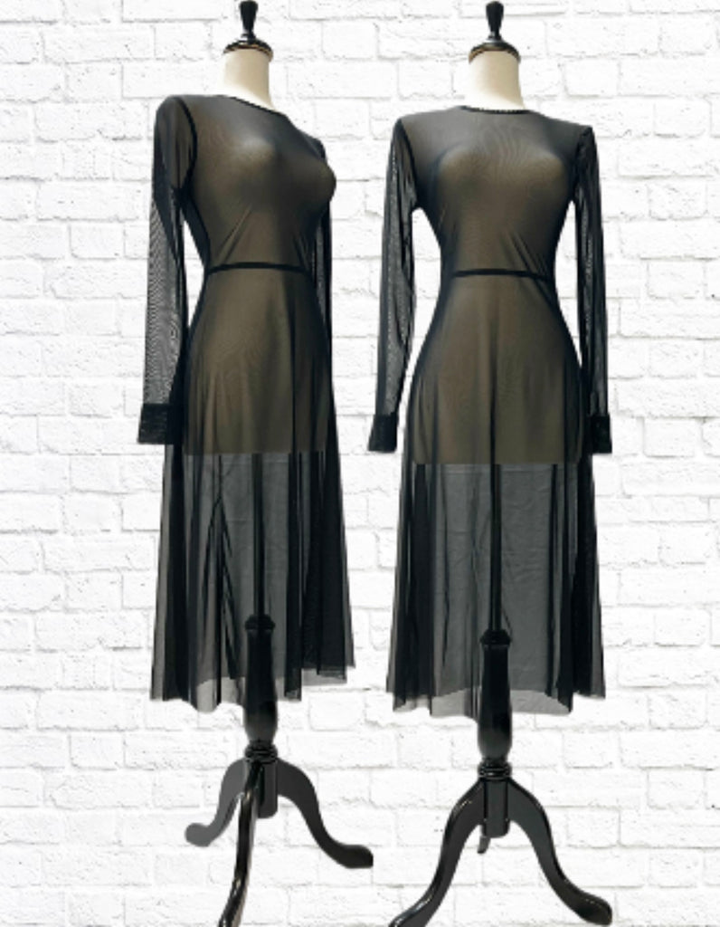 Mannequin forms in front of a white brick background showing the the Poppy Midi Dress with sheer black mesh midi dress with long sleeves and a high neckline in an A-line cut.