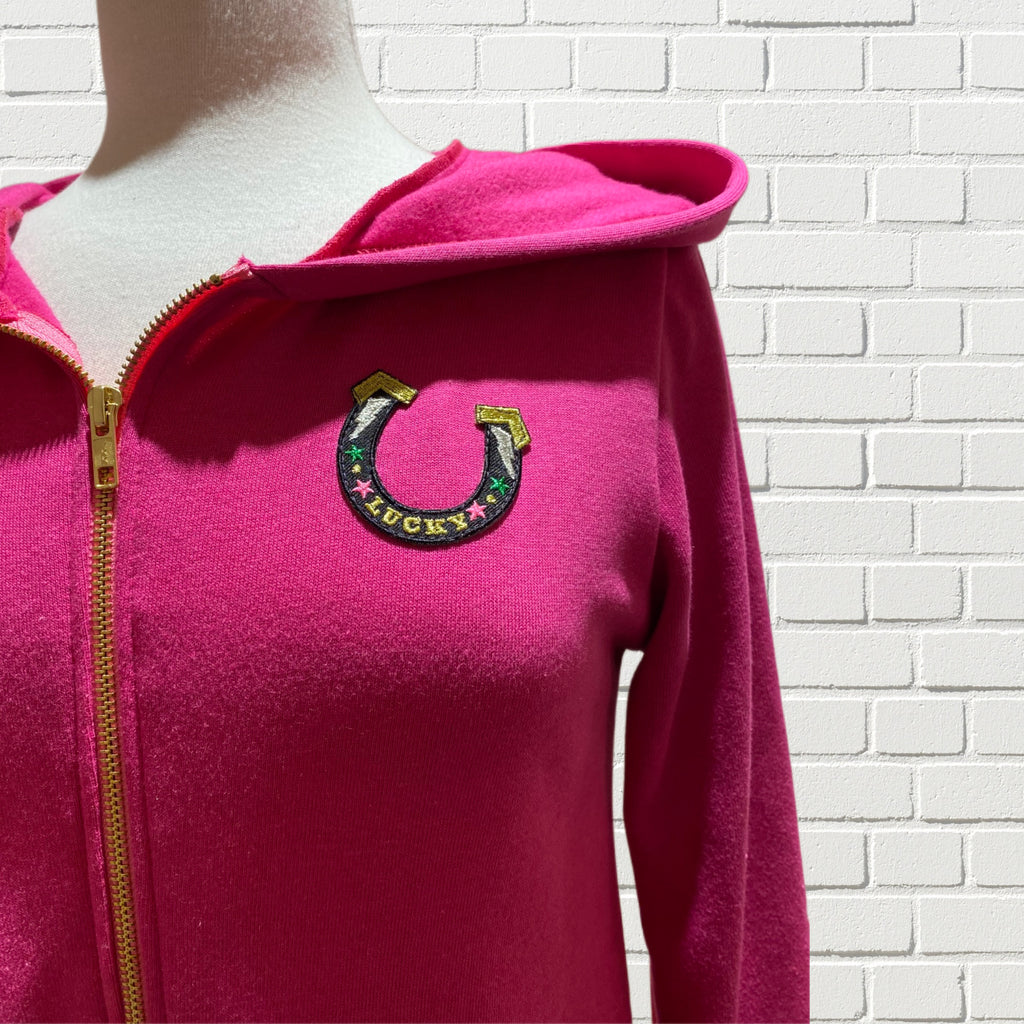 Mannequin form showing the  Rita Hoodie Dress in Hot Pink Bamboo knit French Terry. Classic hood, zip up centre front, flounce hem, long sleeves with bamboo ribbed knit cuffs. 