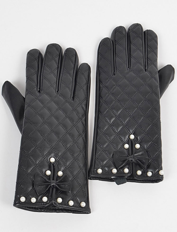 Quilted faux leather gloves with soft lining, faux Pearl details. Available at Blackbird Studios Canada.