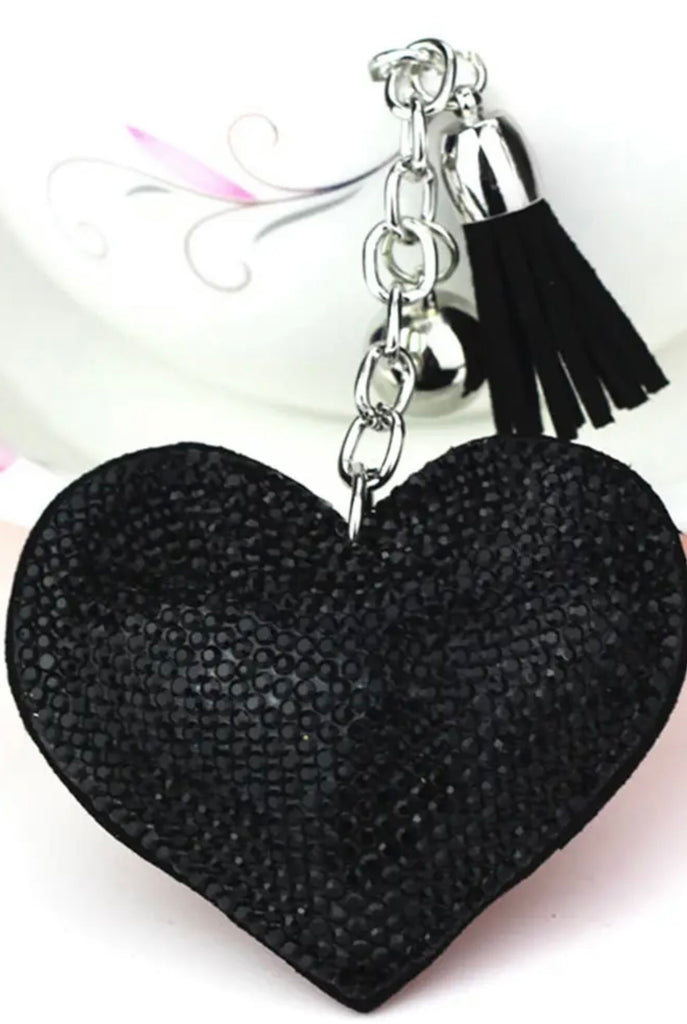 Soft fabric heart keychain encrusted with black rhinestones, attached to a silver chain with a black swede tassel 