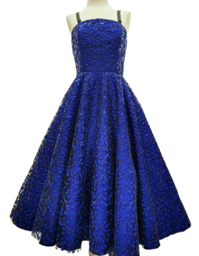 Mannequin form showing the front of the Laura Cocktail dress in a stunning sheer floral sequin over Royal Blue Peau du Soie. 
